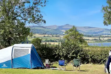 Non electric grass pitches beside Llangorse Lake
