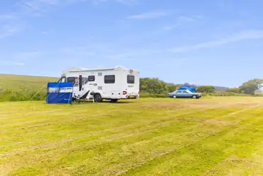 Motorhome and tent on non electric grass pitches