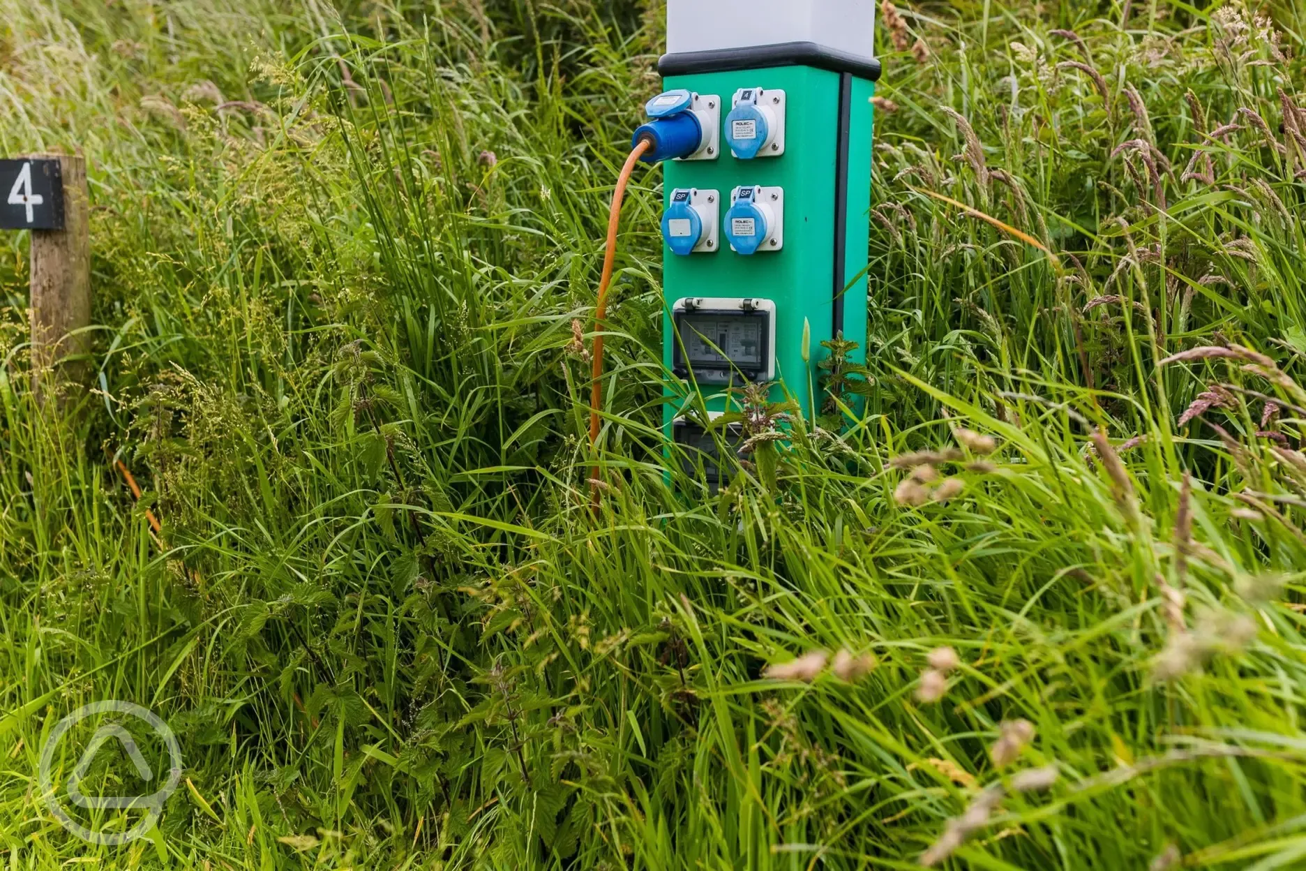 10 amp hook up for electric grass pitches at Llanungar Caravan and Camping