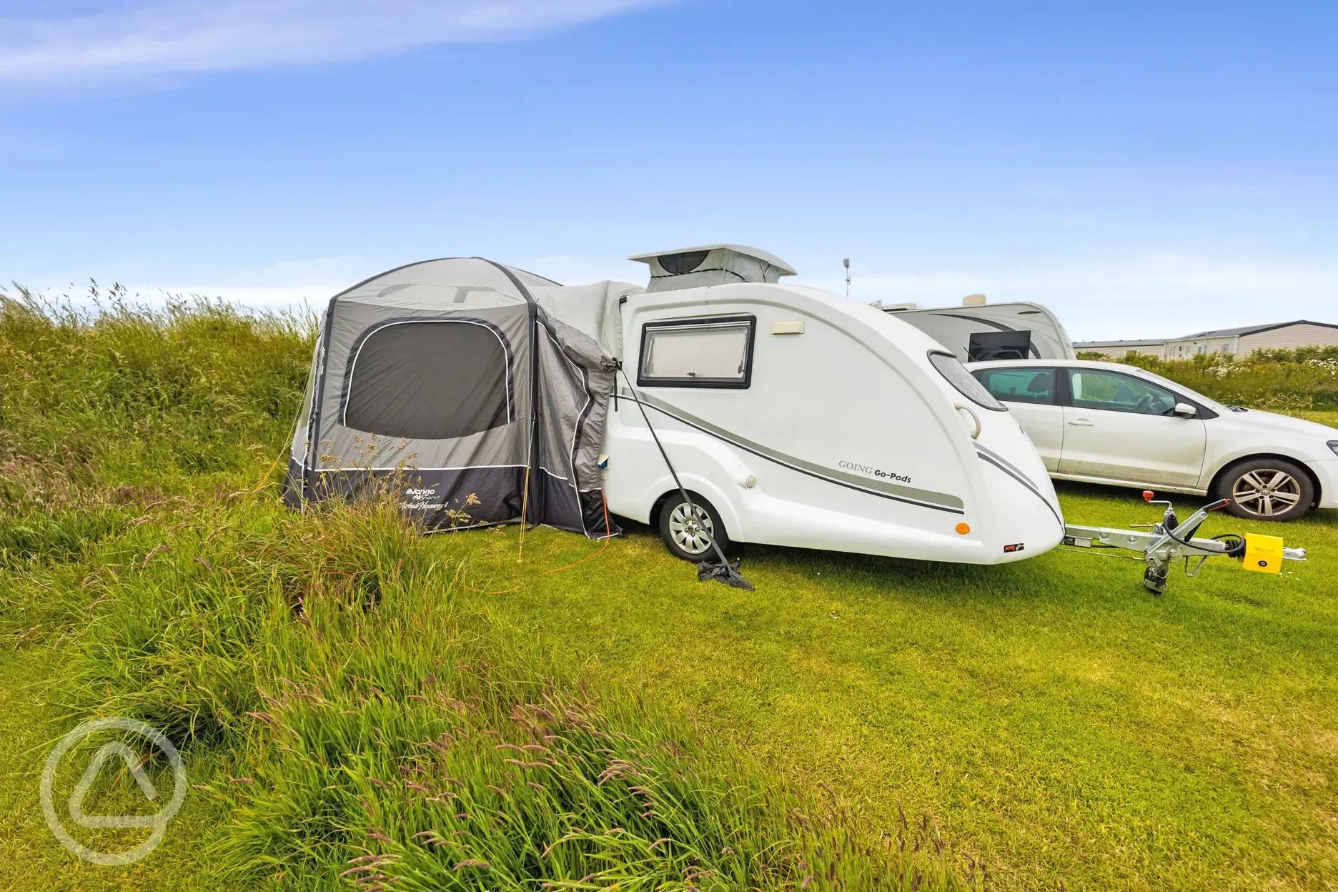 Grass pitches at Llanungar Caravan and Camping