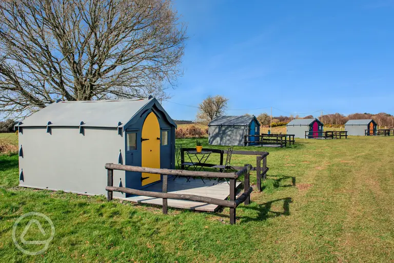 Eco pods, sleeping two with outdoor decking area