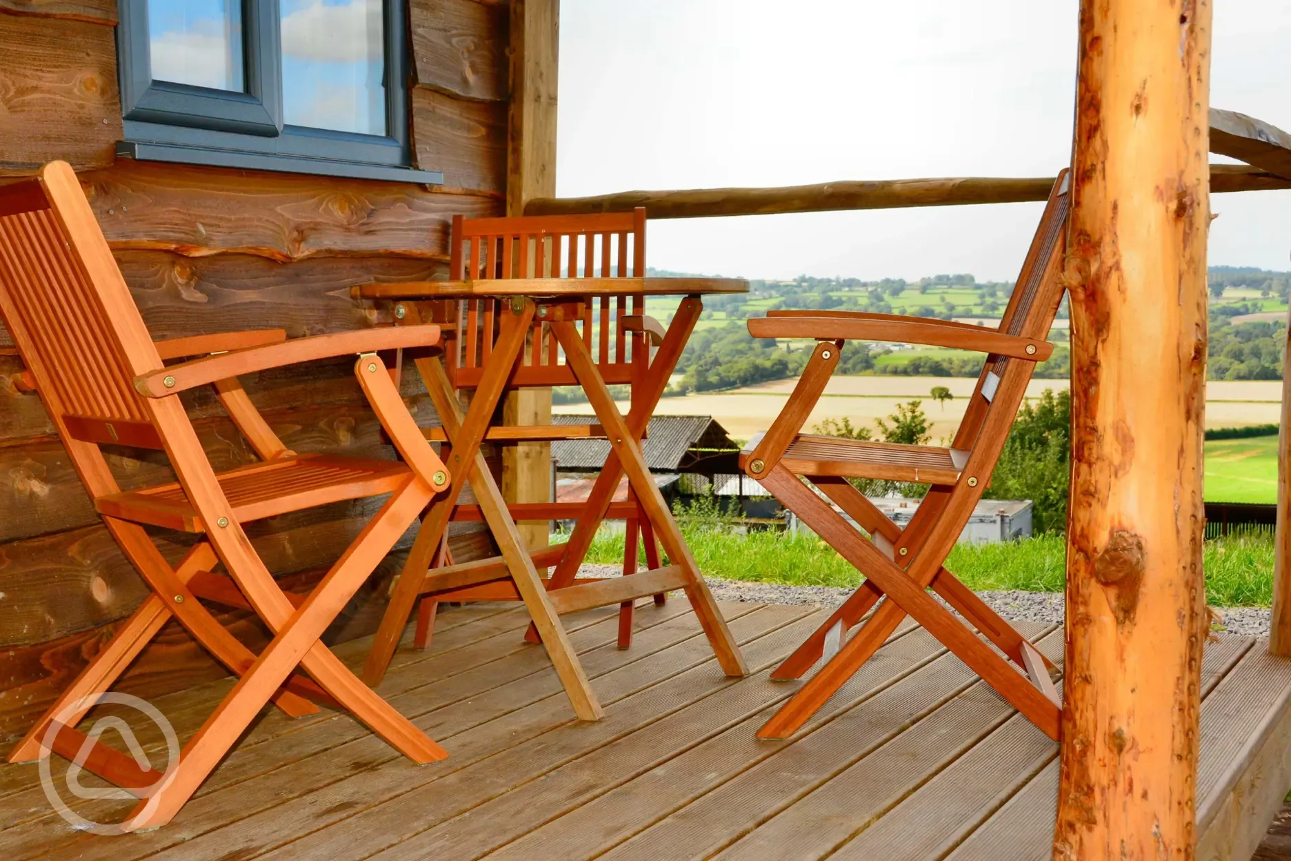 Caradoc Lodge with an outdoor decking and seating Caradoc Lodge with an outdoor decking and seating
