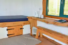 Shepherd hut with a double mattress (bedding not included but can be hired) Shepherd hut with a double mattress (bedding not included but can be hired)