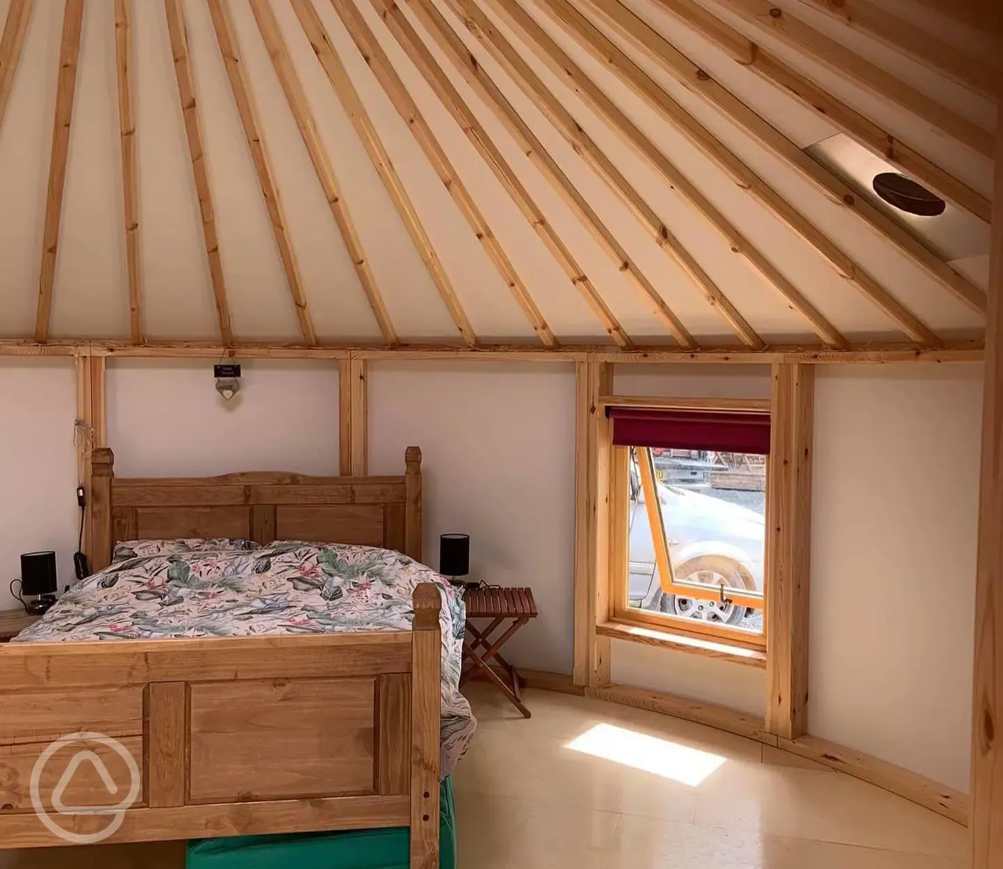 Roundhouse interior with a double bed Roundhouse interior with a double bed