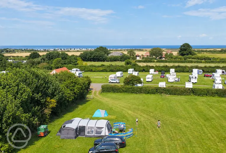 Aerial of Mill Farm Country Park with views to Moos Beach