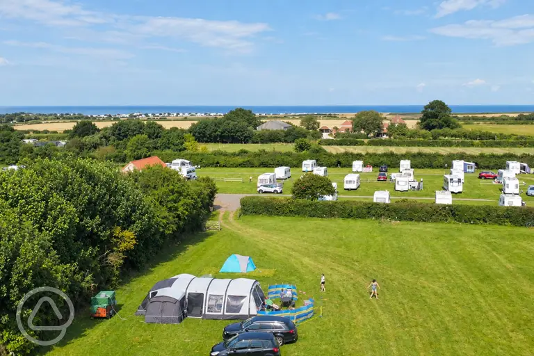 Aerial of Mill Farm Country Park with views to Moos Beach