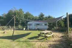 Vintage caravan with shelter