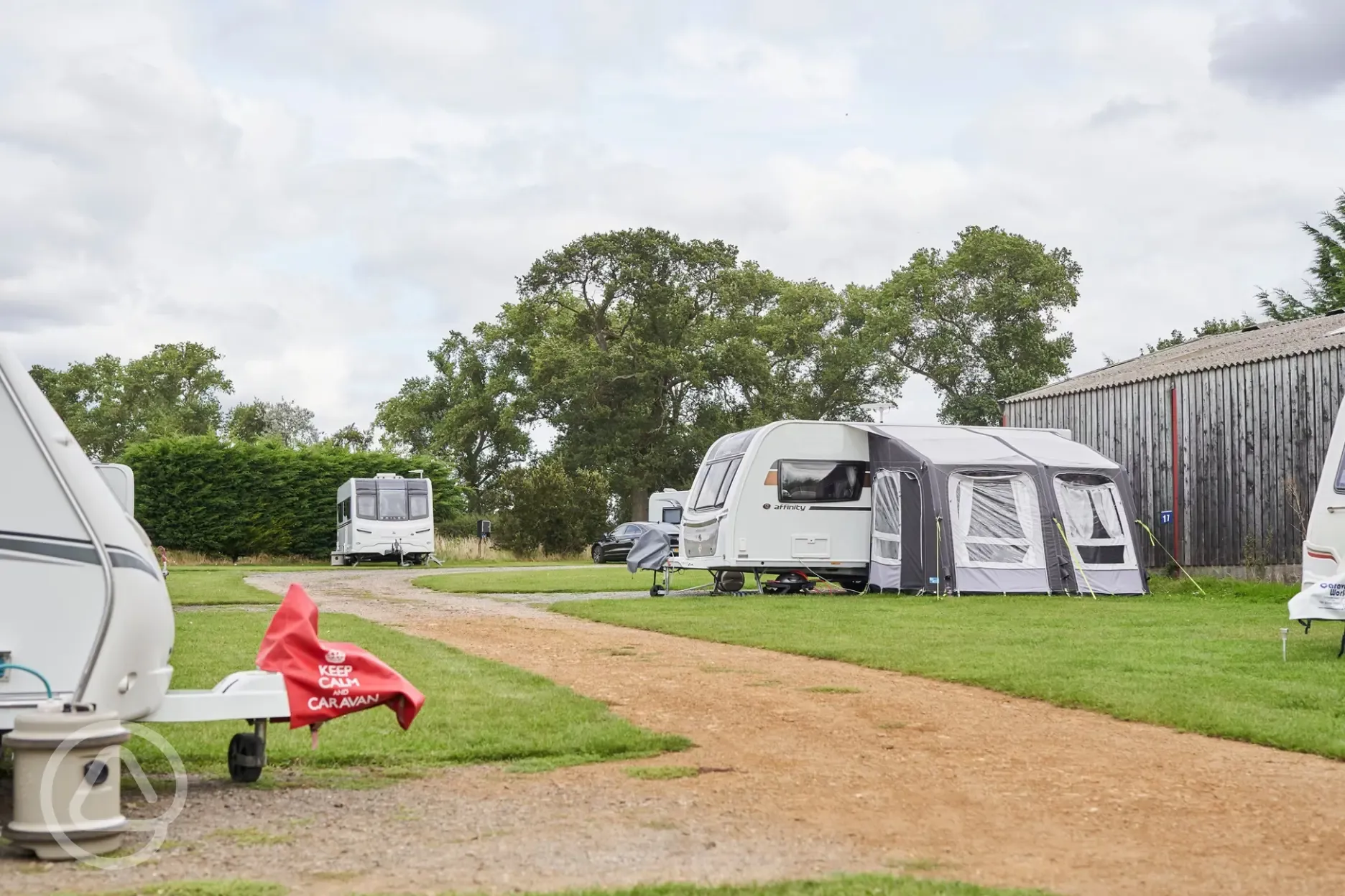 Field barn hardstanding pitches with optional electric at Monks Barn Farm Field barn hardstanding pitches with optional electric at Monks Barn Farm