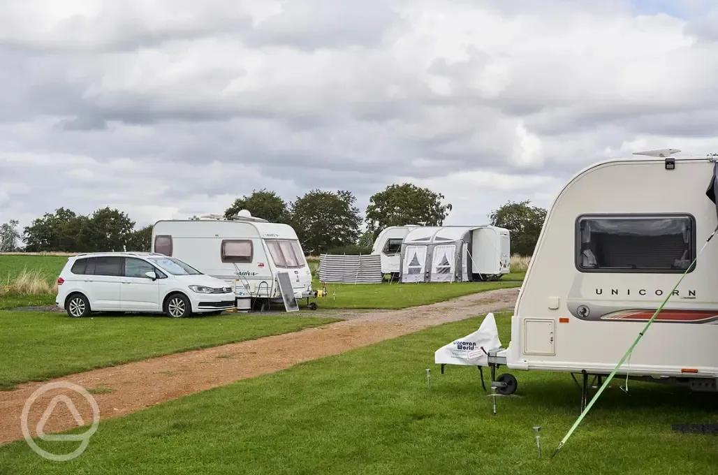 Hardstanding pitches with optional electric at Monks Barn Farm Hardstanding pitches with optional electric at Monks Barn Farm