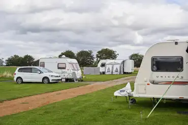 Hardstanding pitches with optional electric at Monks Barn Farm