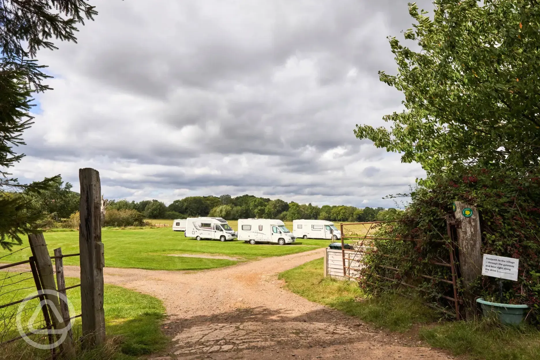 Lower meadow grass pitches with optional electric Lower meadow grass pitches with optional electric