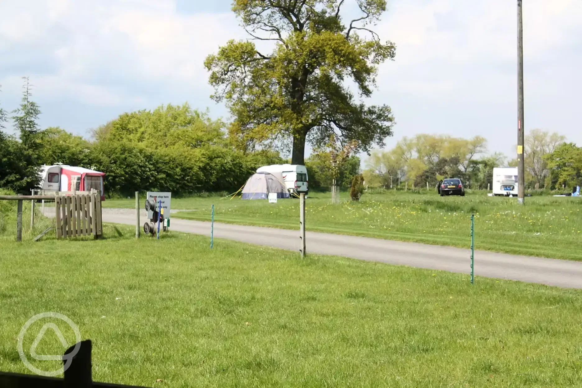 Lower meadow grass pitches with optional electric Lower meadow grass pitches with optional electric