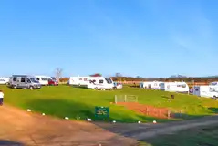 Grass touring pitches (electric and fully serviced options available)