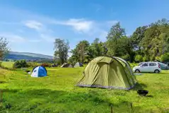 Non electric grass pitches with space for a parked car Non electric grass pitches with space for a parked car