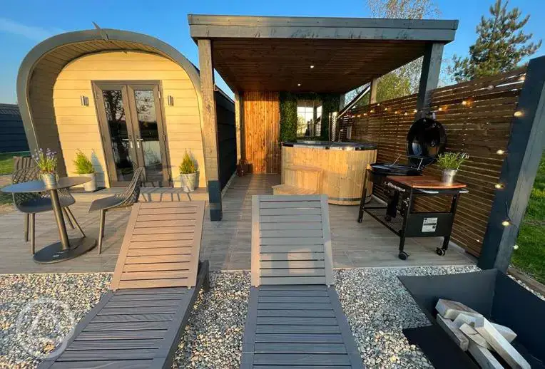 Glamping pod with hot tubs