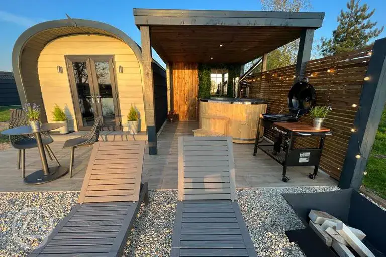 Glamping pod with hot tubs