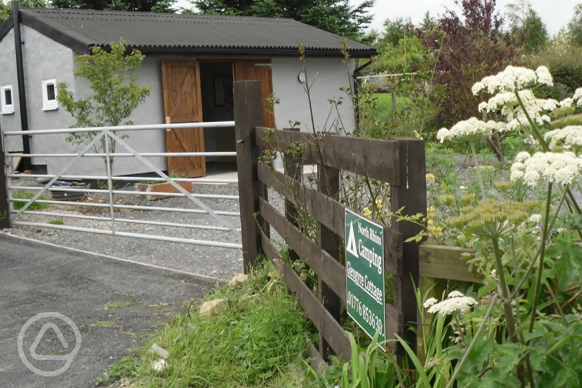 Campsite entrance with facilities block