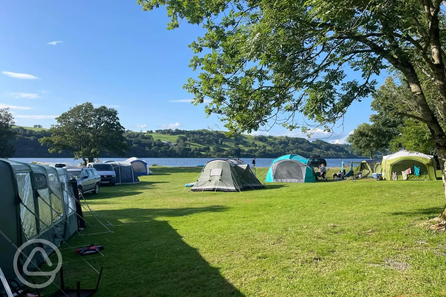 Grass pitches close to the lake Pant Yr Onnen Lakeside campsite 