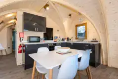 Parkgate kitchen with oven, hob, fridge/freezer, microwave, toaster and kettle