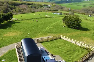 Aerial of Cambeak shepherd's hut with countryside views