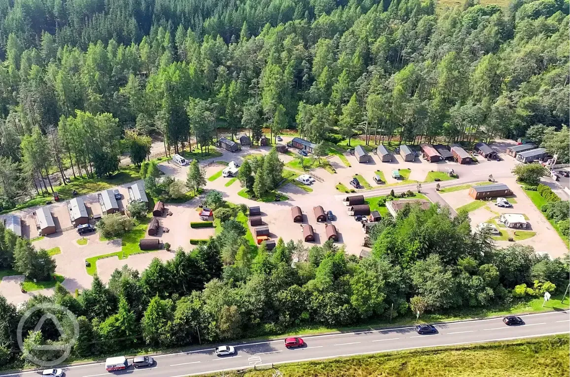 Bird's eye view of Tyndrum Holiday Park surrounded by woodland