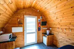 Small ensuite hiker pod interior kitchen area