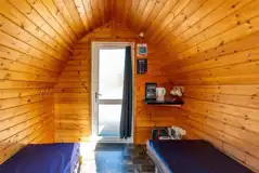 Small hiker pod interior with kettle and mugs
