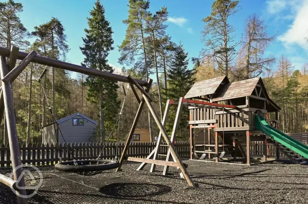 Children's playground with swings and slides