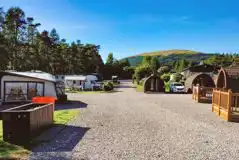 Fully serviced hardstanding touring pitches and hiker pods