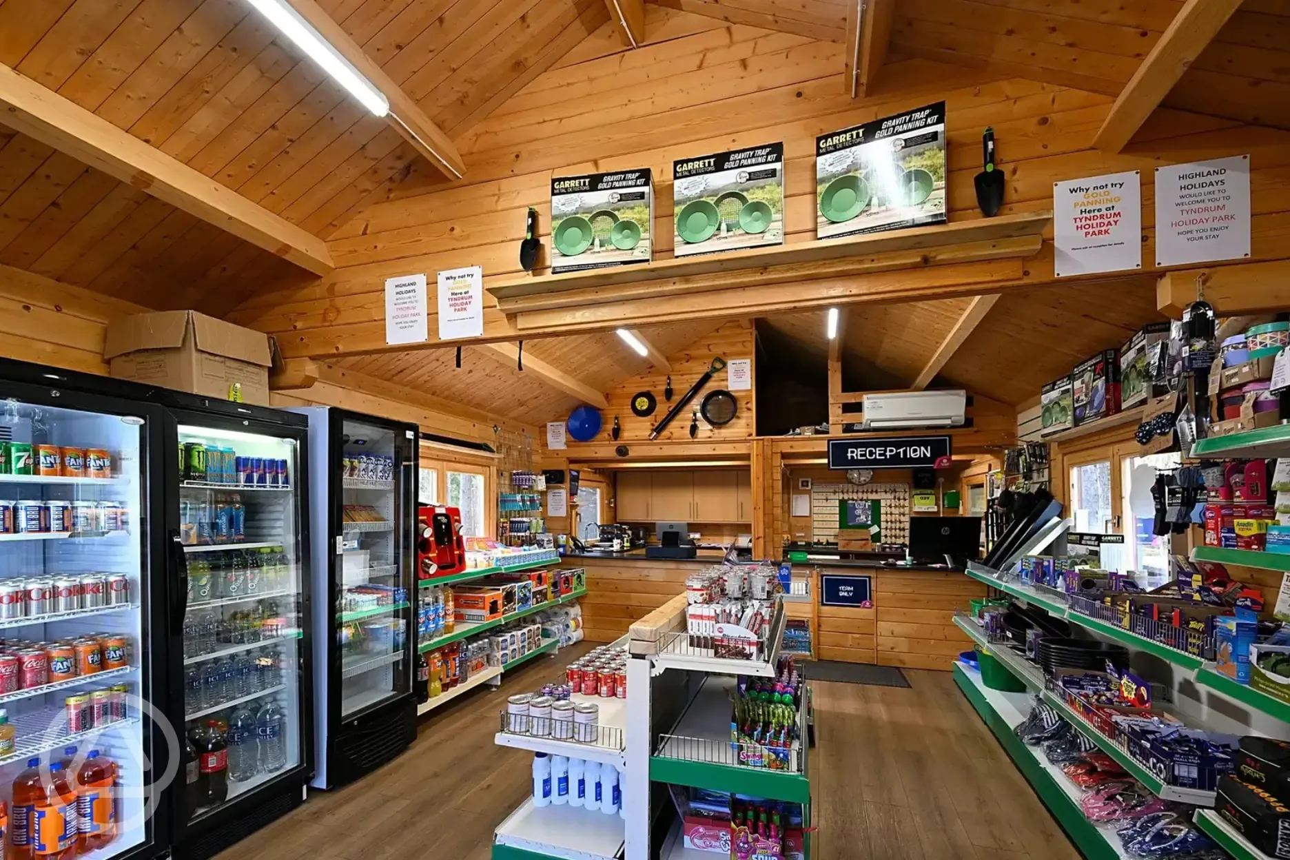 Onsite shop stocking essential items, camping gear and insect repellant