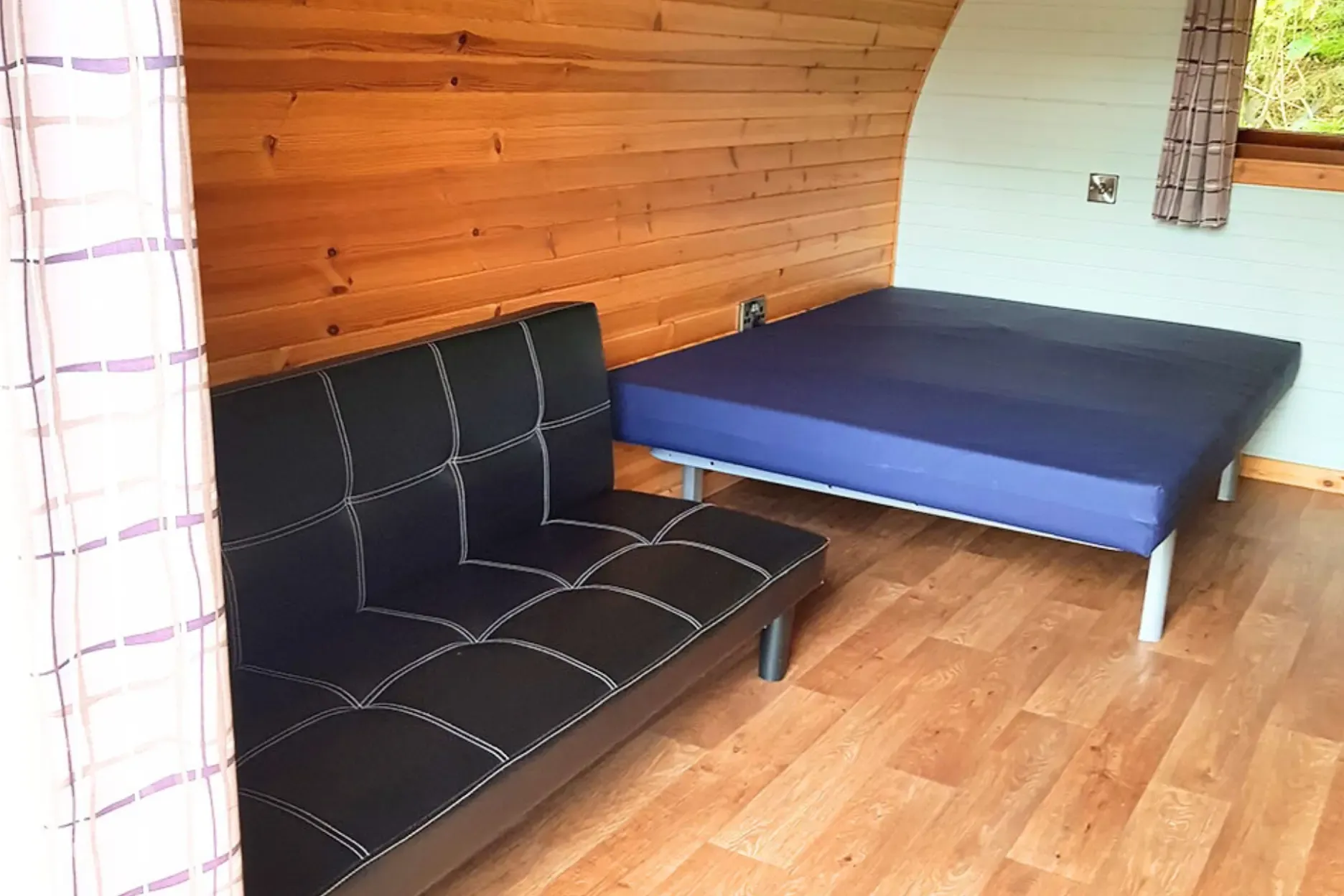 Large hiker pod with sofa bed interior, sleeping up to five and dog friendly