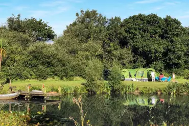 Non electric grass pitches by the lake