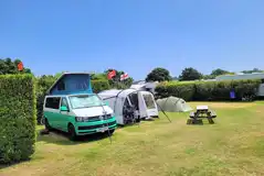 Fully serviced grass pitches Fully serviced grass pitches