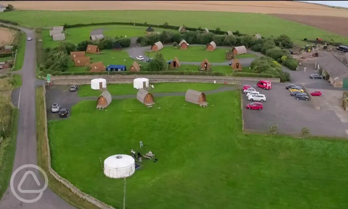 Aerial view of the full site with wigwams and yurts