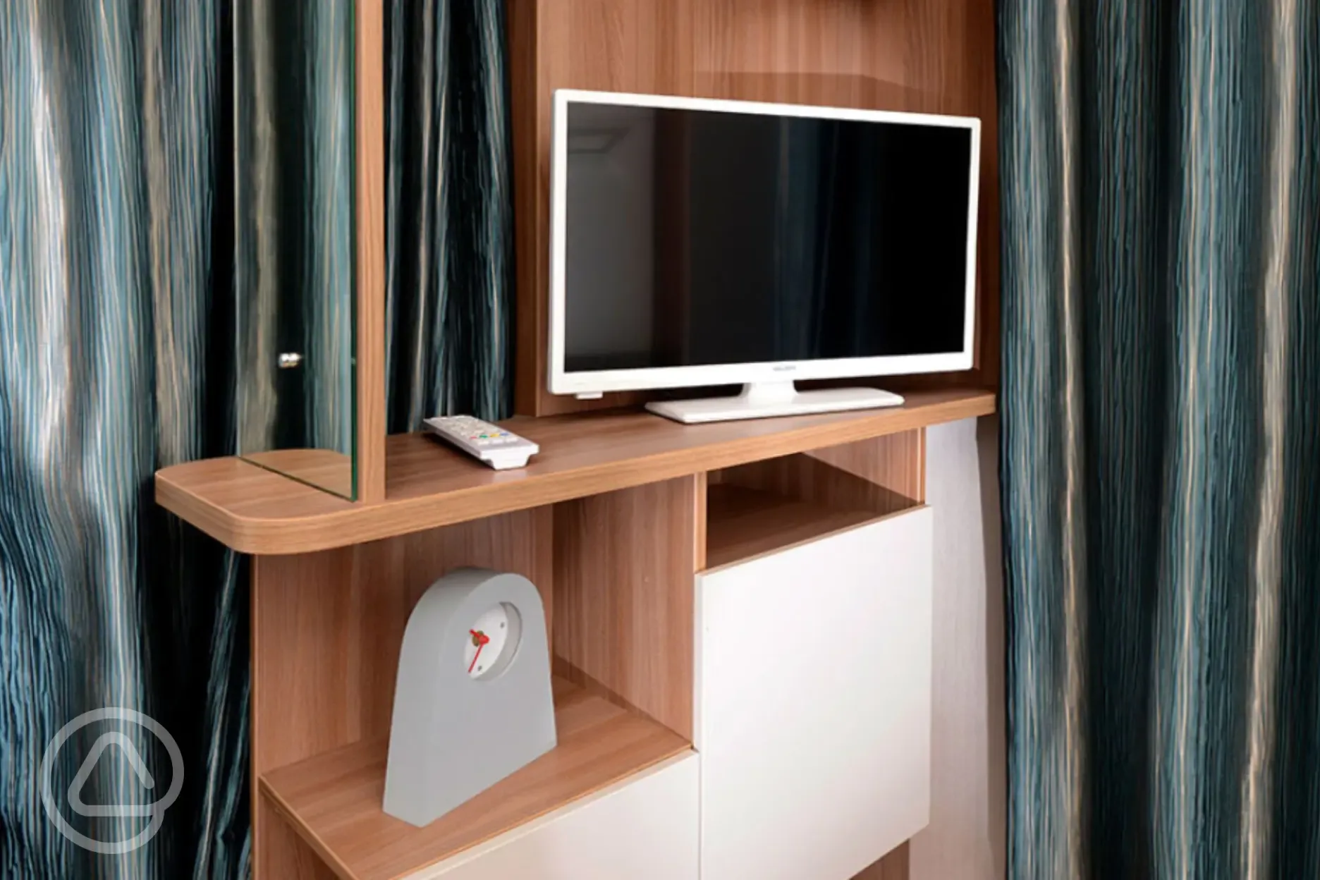 TV in glamping cabin at Queensberry Bay