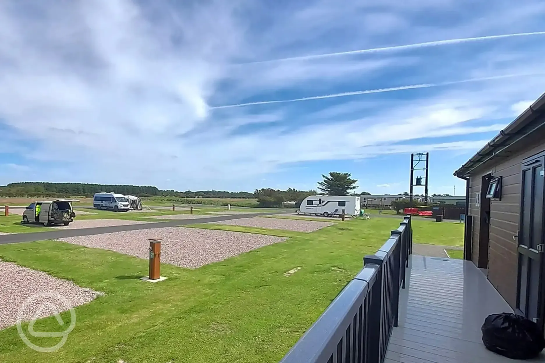 Dunlin electric hardstanding pitches with grass