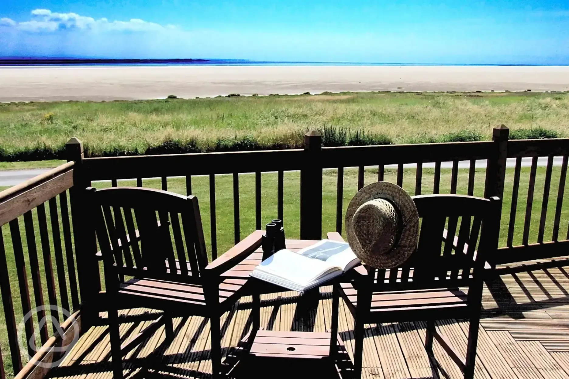 View from glamping cabin with a private decking and seating