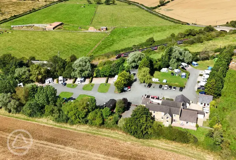 Aerial of the campsite and The Railway Inn
