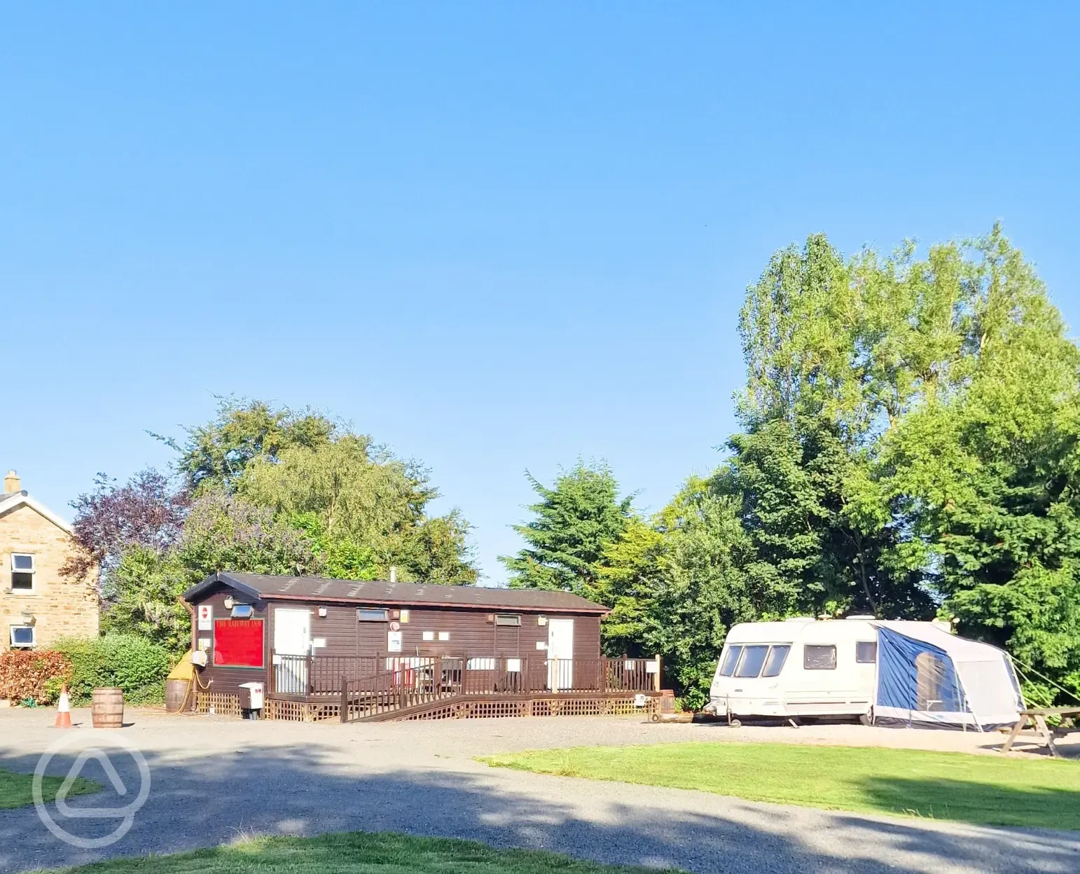 Electric hardstanding pitches with facilities