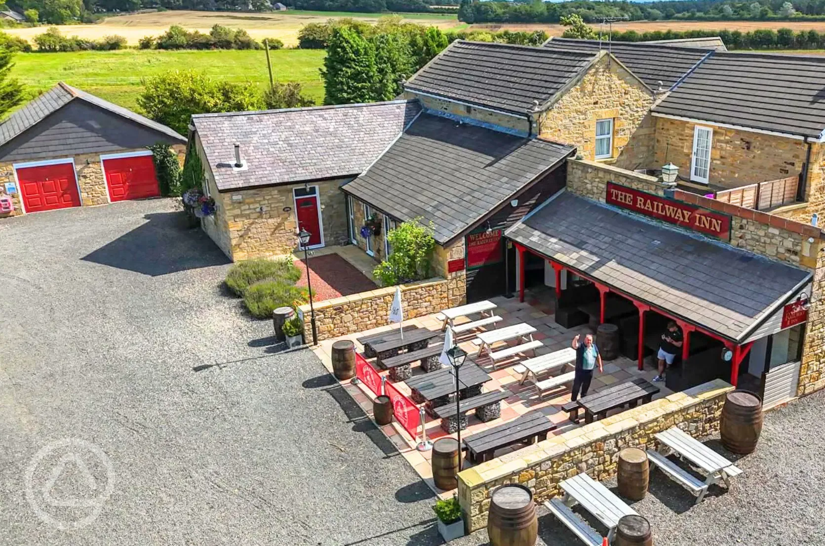 Aerial of The Railway Inn with outdoor seating