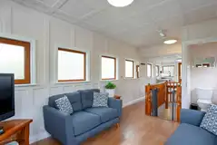 The Ark houseboat top level with a lounge and kitchen