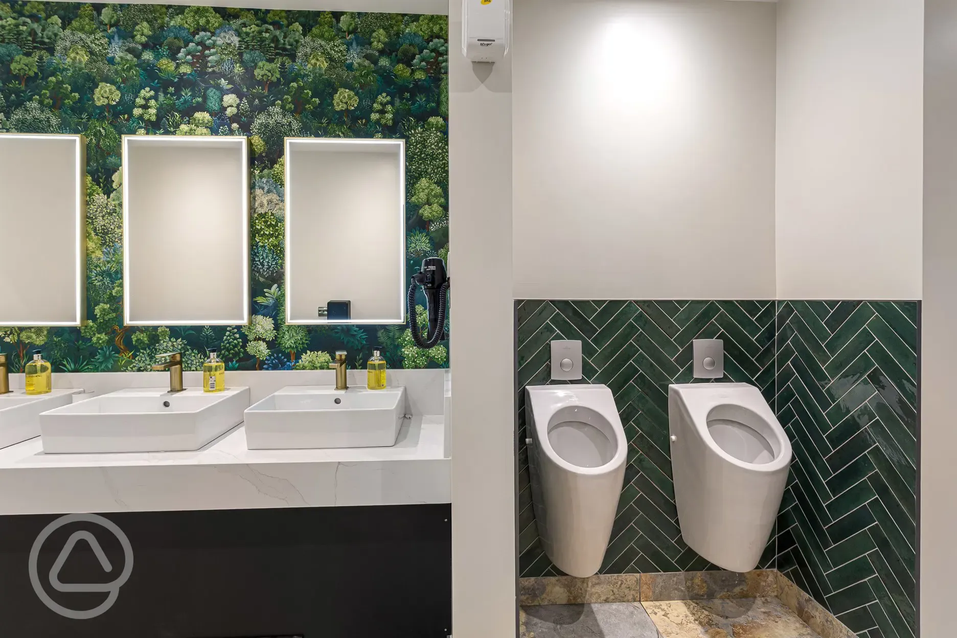 Men's facilities with urinals, sinks and mirrors