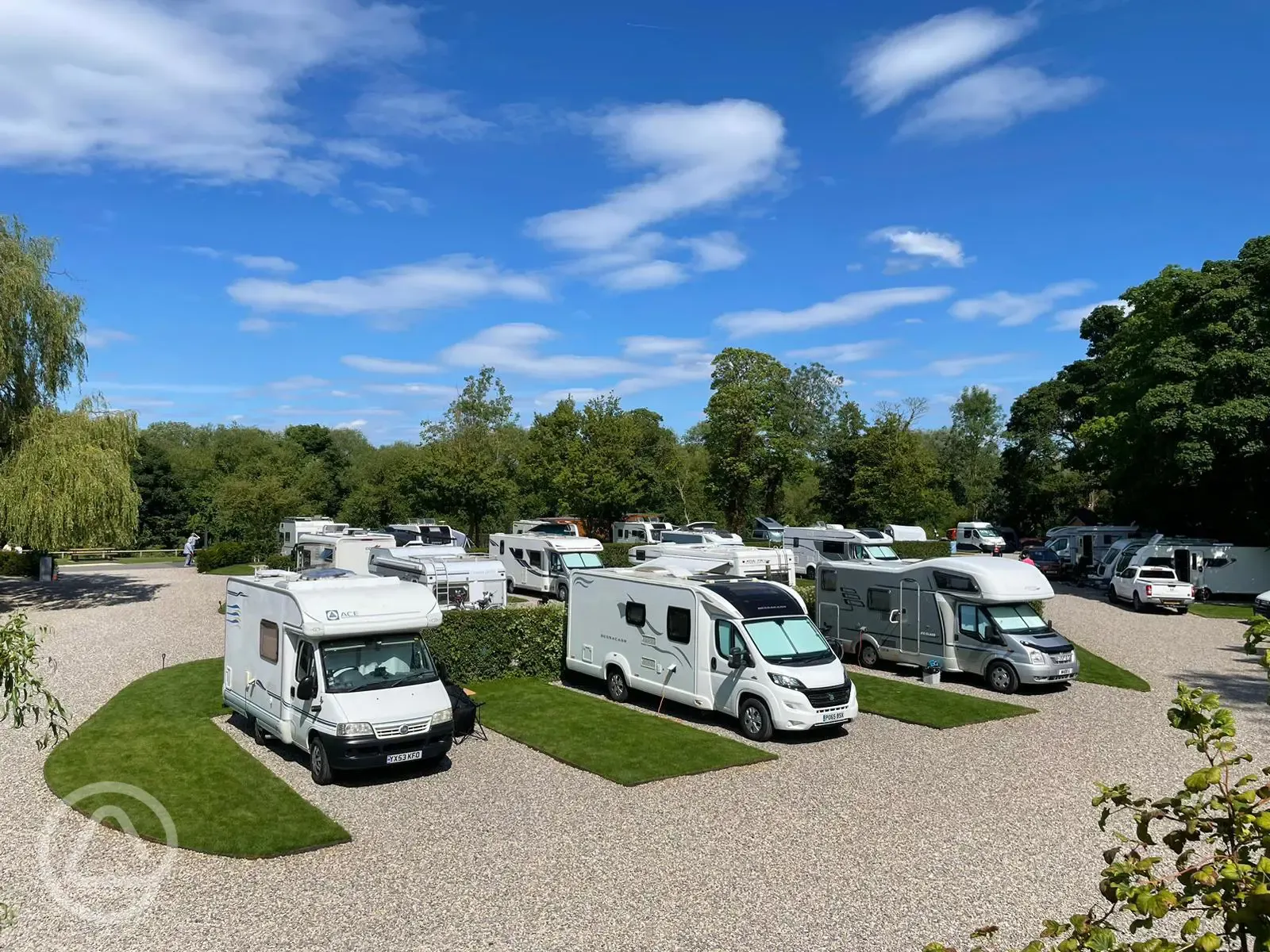 Hardstanding pitches suitable for campervans, caravans, and motorhomes up to 10m