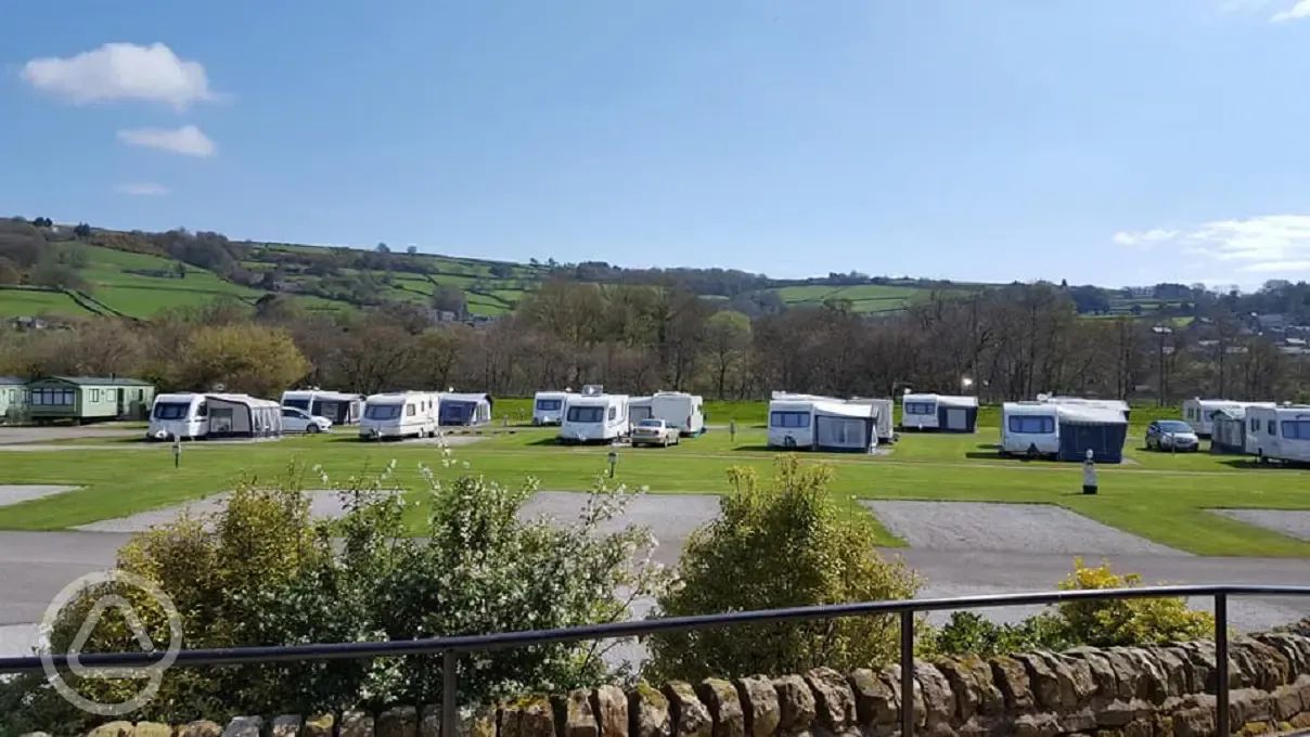 Grass and hardstanding pitches at Riverside Caravan Park
