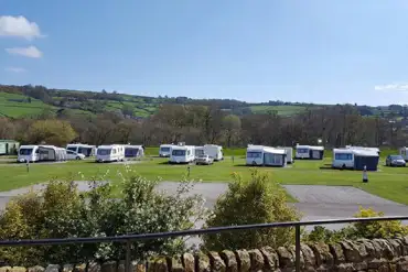 Grass and hardstanding pitches at Riverside Caravan Park