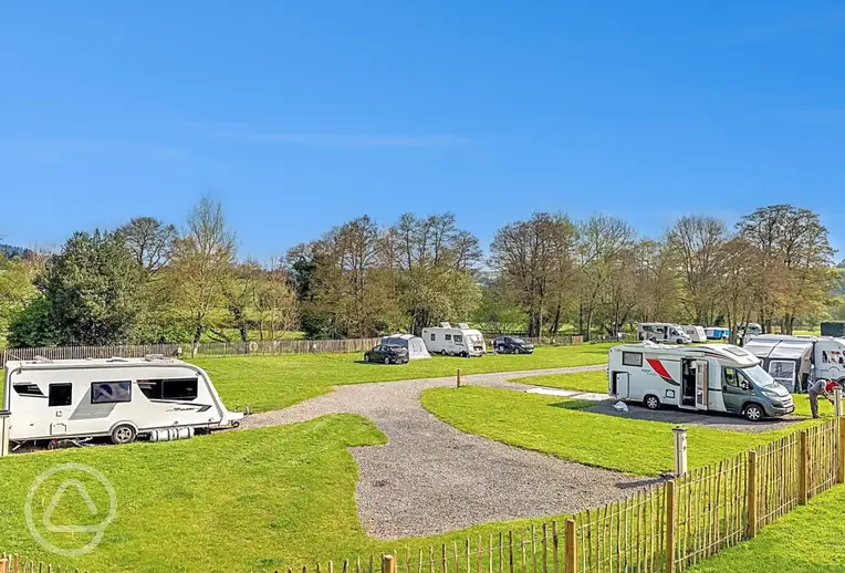 Hardstanding 5m x 8m pitches with electric hook ups
