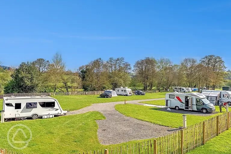 Hardstanding 5m x 8m pitches with electric hook ups