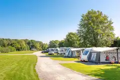 Fully serviced hardstanding touring pitches with electric, water and grey waste