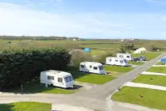 Fully serviced hardstanding touring pitches (12m x 6m)