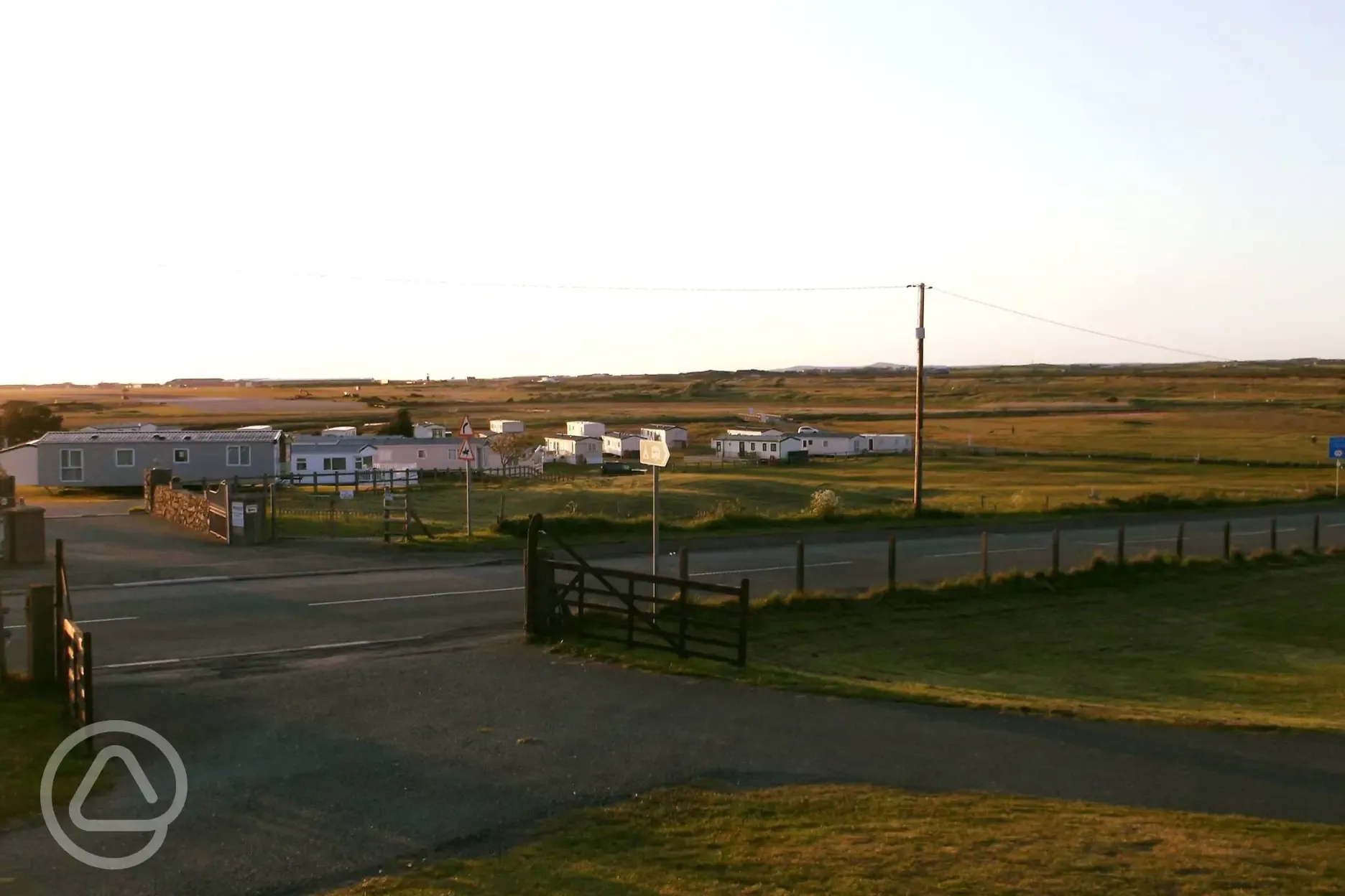 Entrance to the park, RAF Valley in the distance 